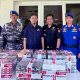 Tim gabungan Ditpolairud Polda Gorontalo, TNI AL dan Bea Cukai Gorontalo usai mengamankan roko ilegal. (foto.istimewa)